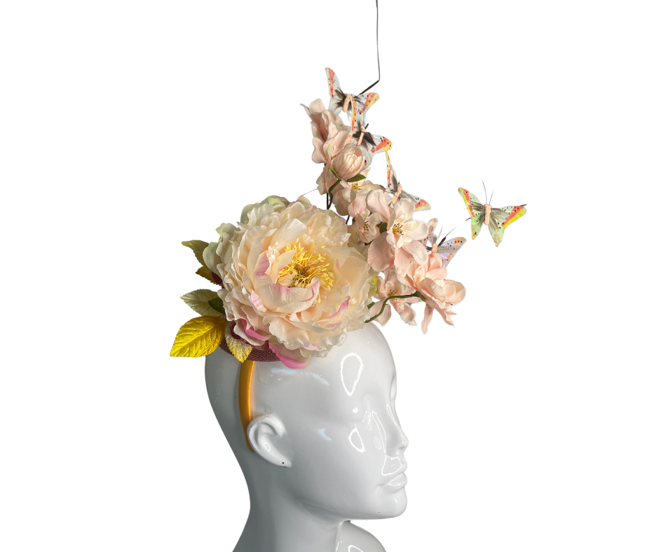 Flitterblüte mit Schmetterling und Feder Faszinator